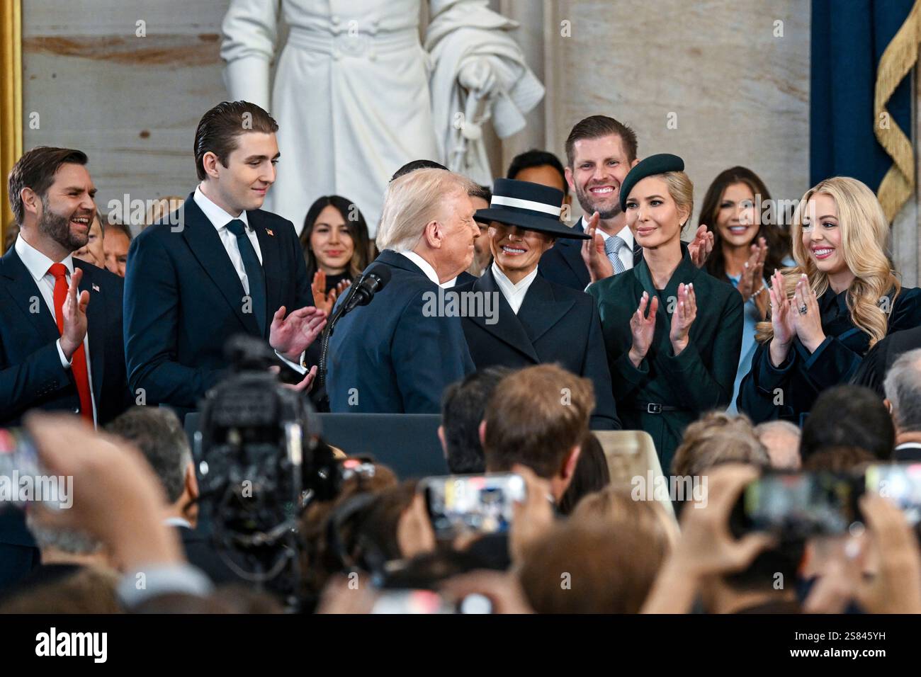 President Donald Trump, center, reacts after he is sworn in as Vice ...