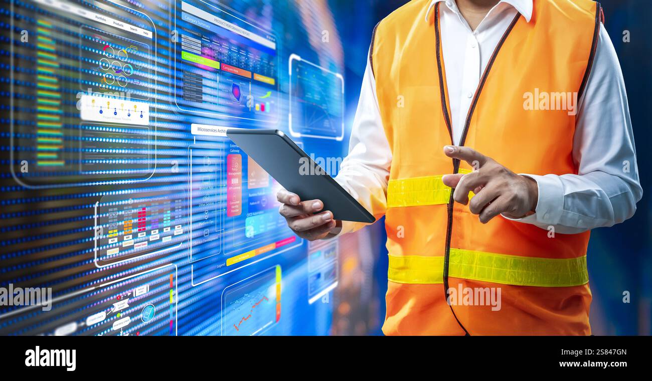 Automation industry concept with engineer work with digital graphic interface Stock Photo