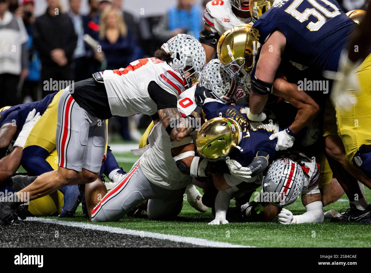 January 20, 2025 Notre Dame quarterback Riley Leonard (13) pushes into