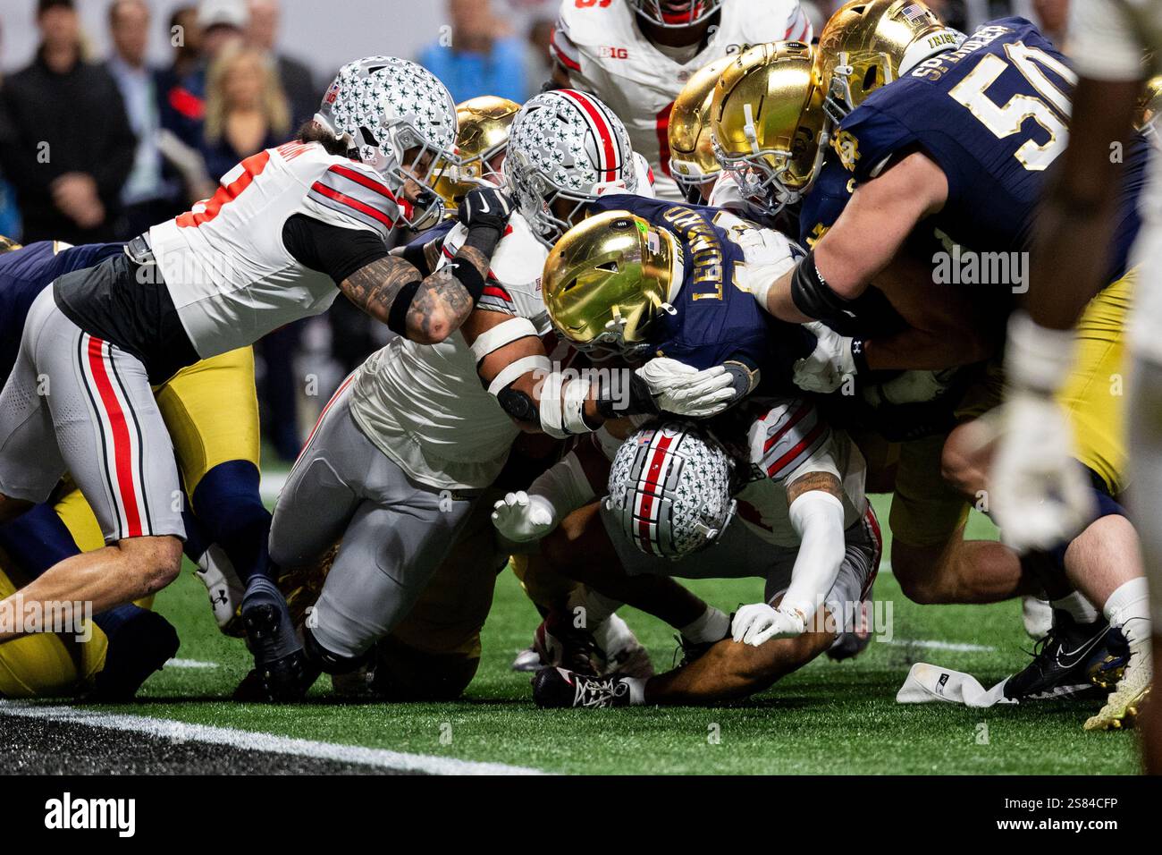 January 20, 2025 Notre Dame quarterback Riley Leonard (13) pushes into