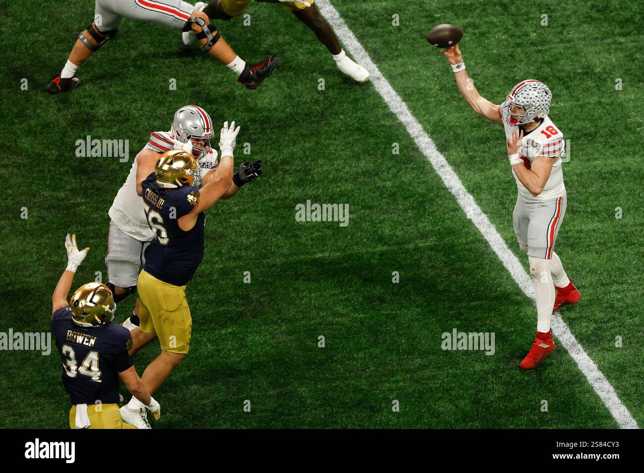 Ohio State quarterback Will Howard passes against Notre Dame during