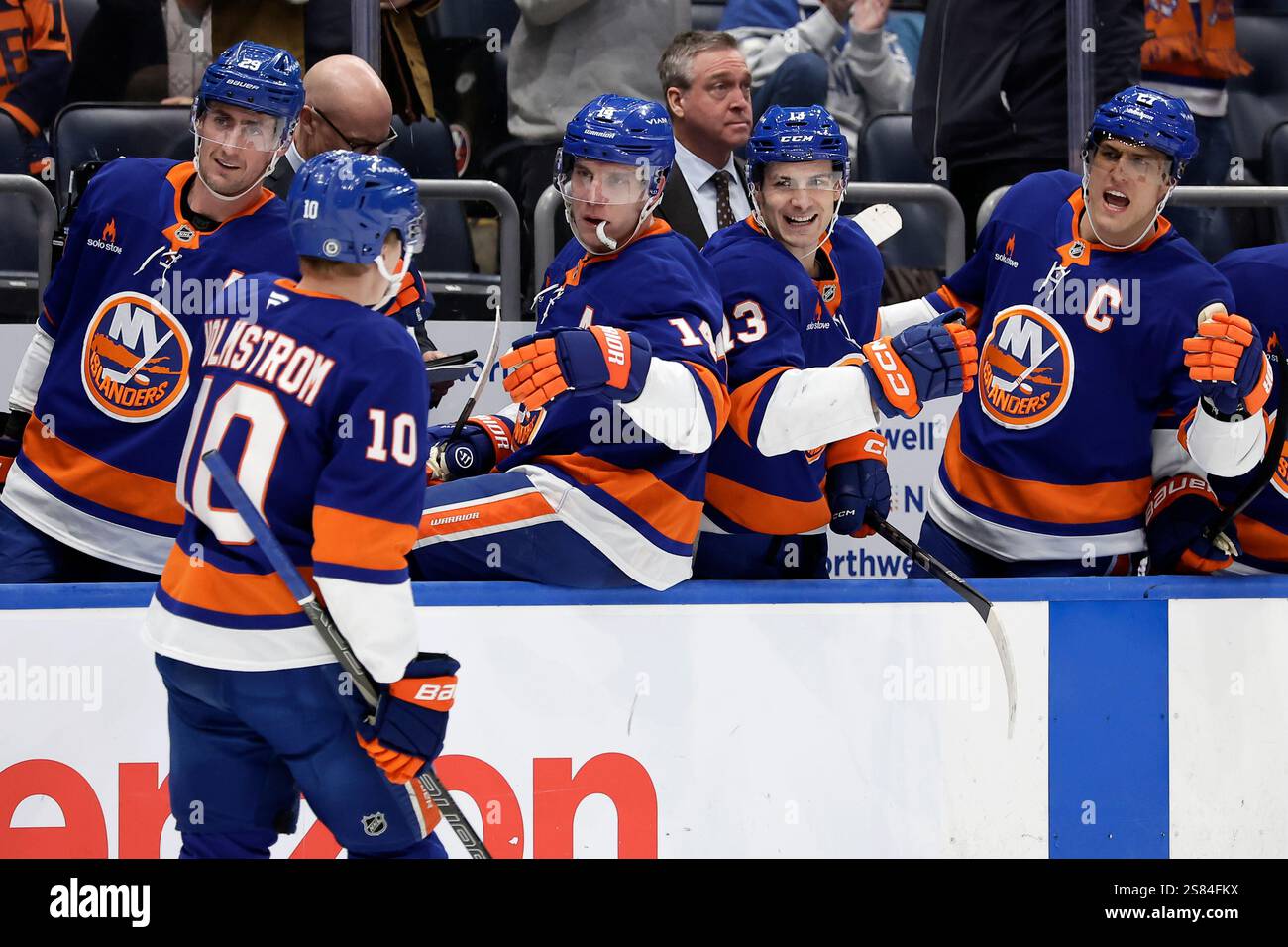 New York Islanders right wing Simon Holmstrom (10) is congratulated by