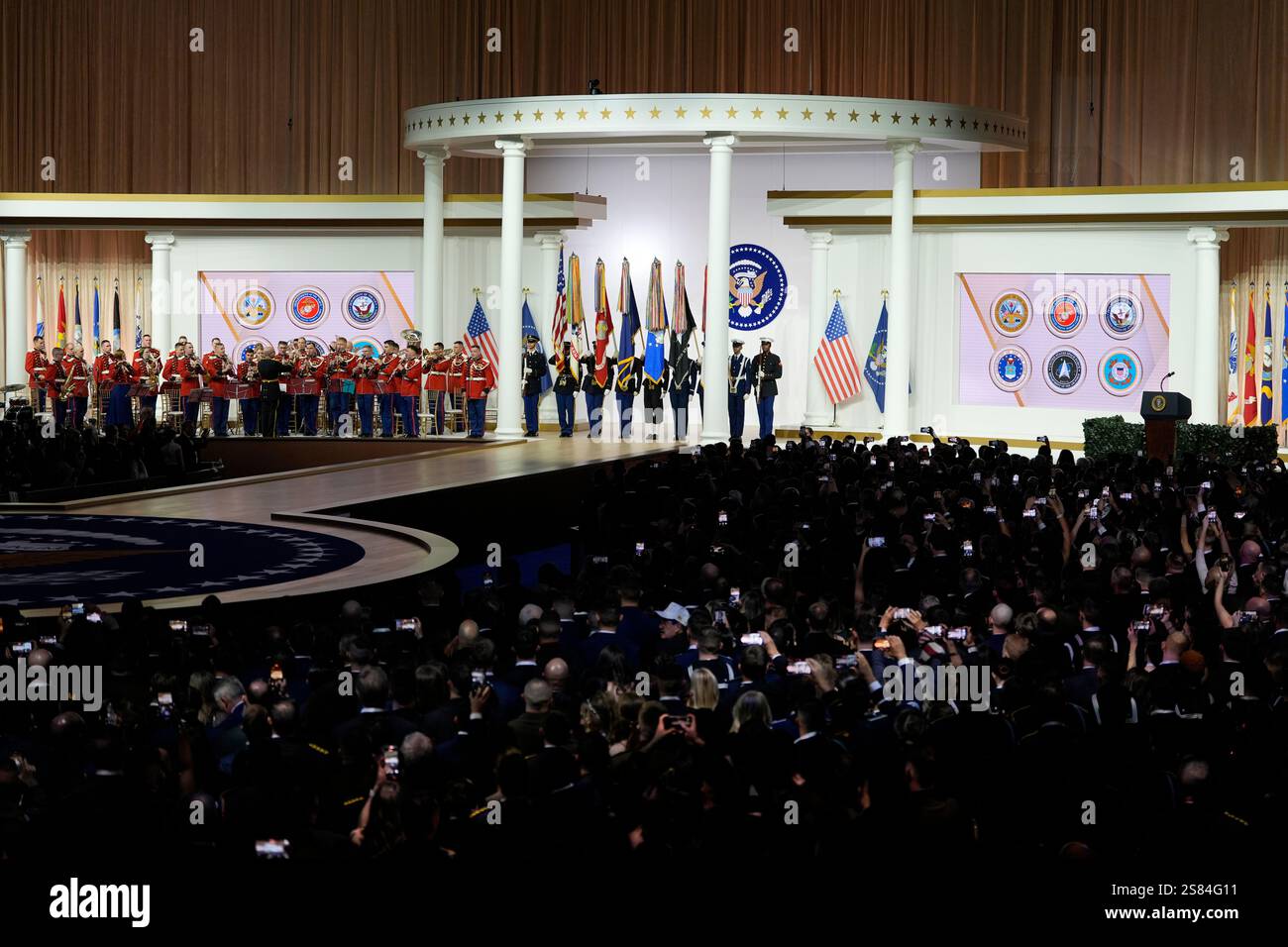 Guests mingle as a military band plays at the Commander in Chief Ball