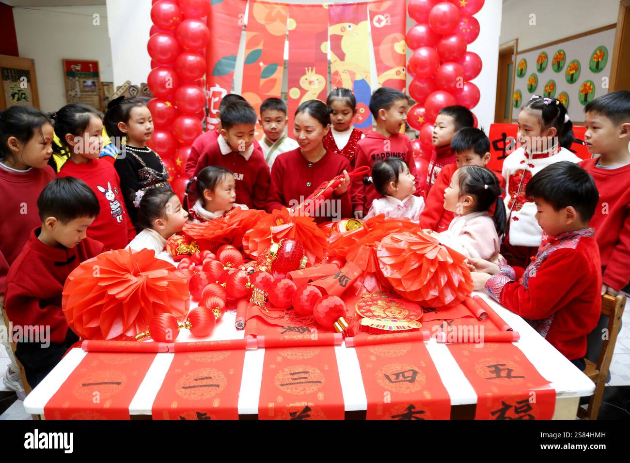 LIANYUNGANG, CHINA JANUARY 21, 2025 A teacher guides children in