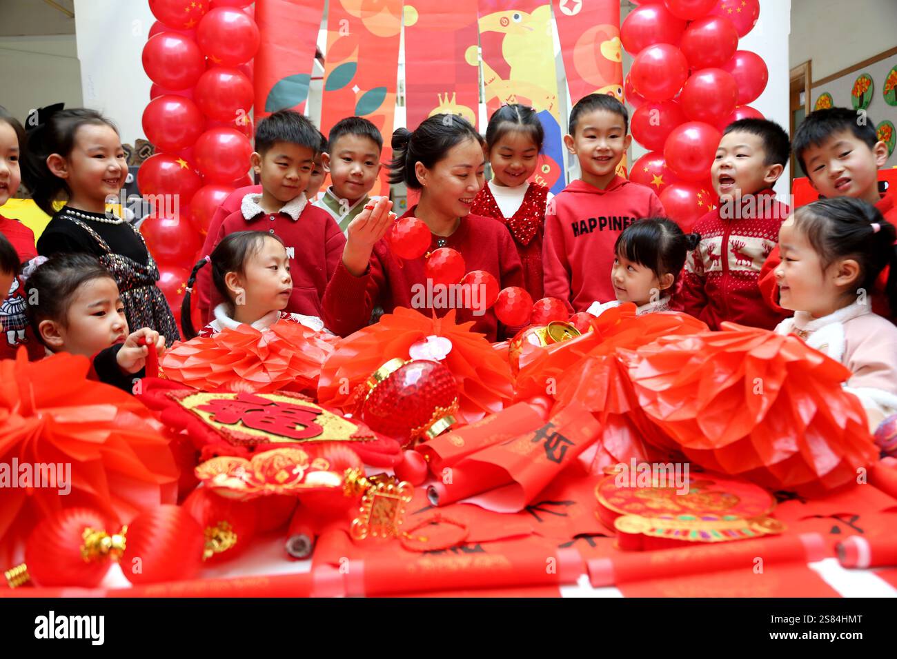 LIANYUNGANG, CHINA JANUARY 21, 2025 A teacher guides children in