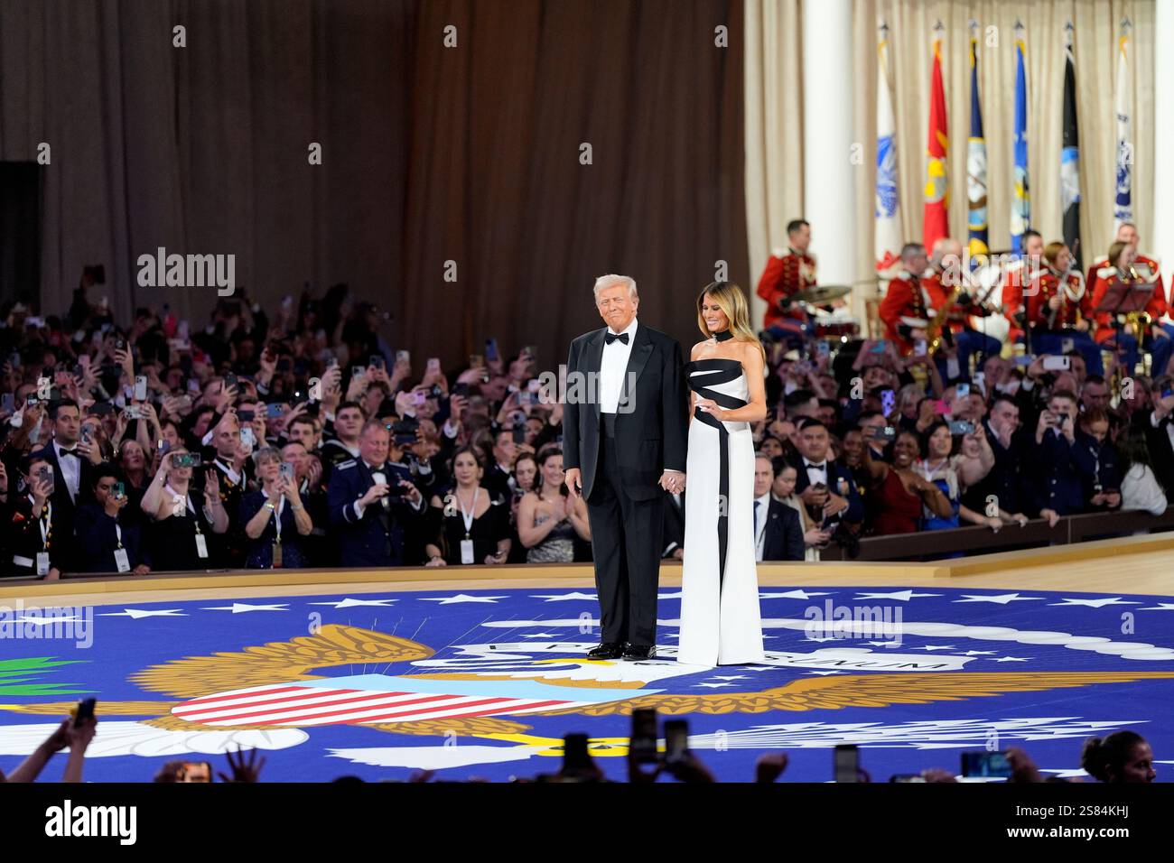 President Donald Trump, left, and first lady Melania Trump arrive at the Commander in Chief Ball