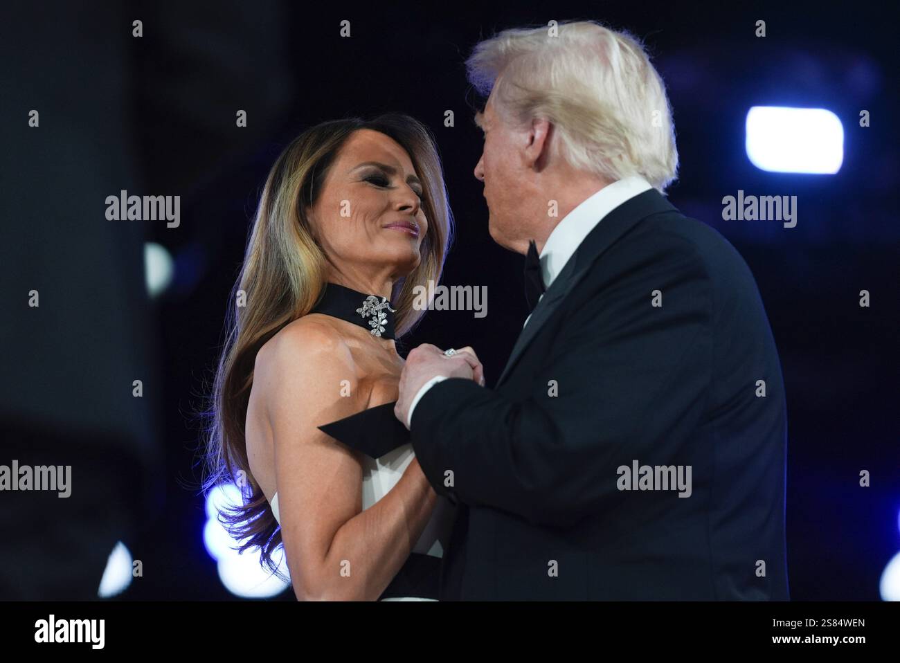 President Donald Trump and first lady Melania Trump dance at the