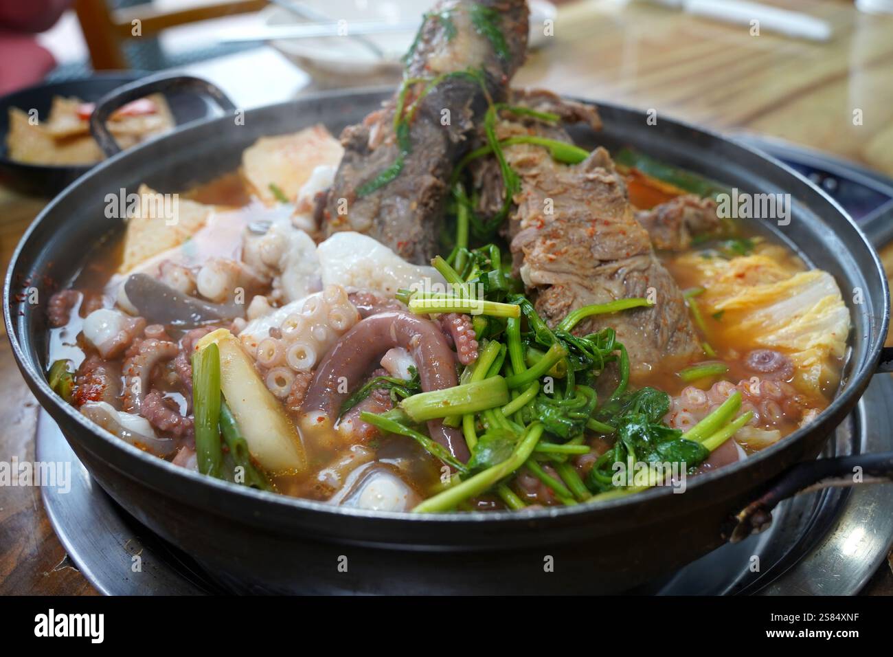 Korean health food made by boiling octopus and ribs together Stock ...