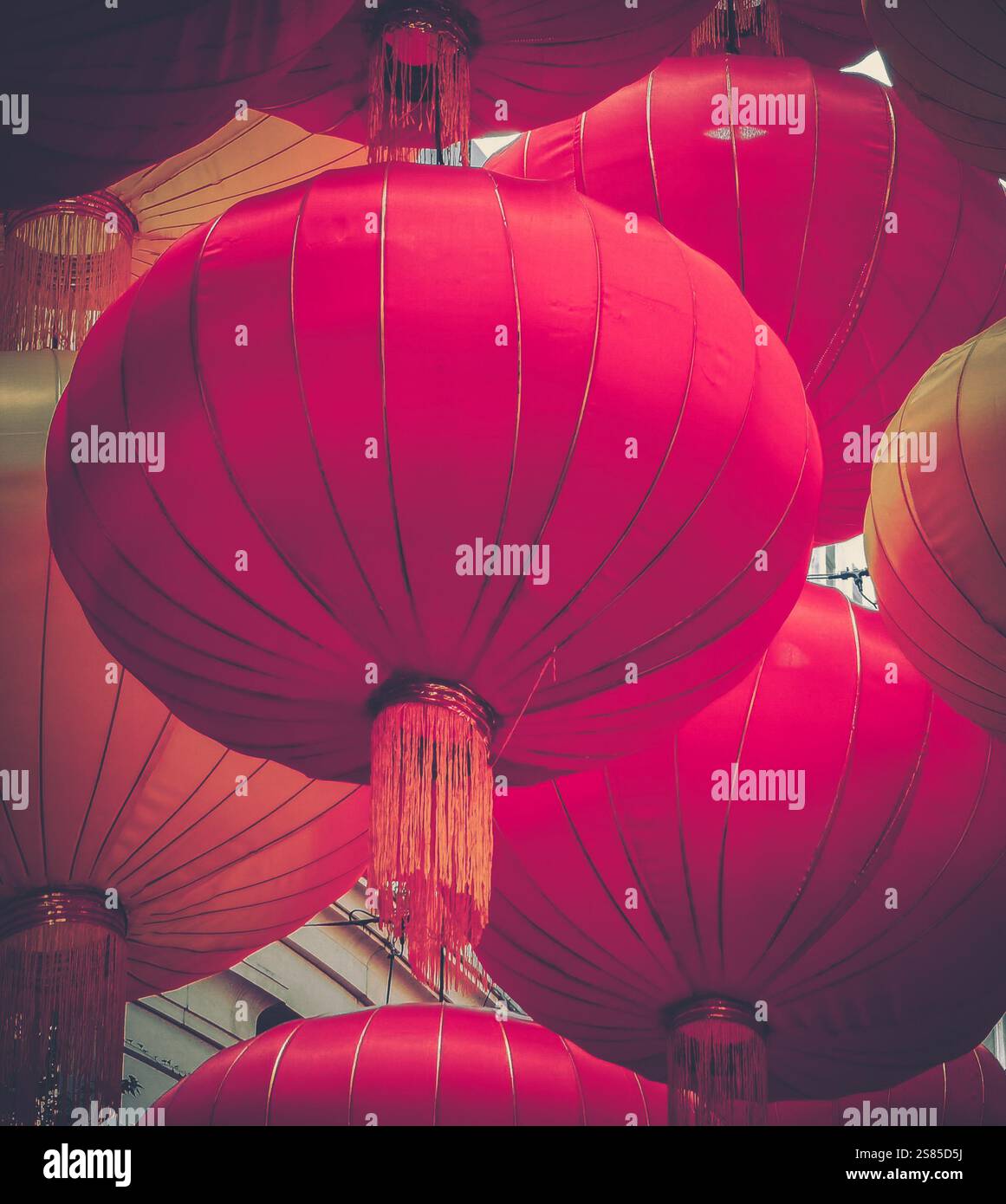 Vibrant red and gold Chinese lanterns hang, celebrating the joyous ...
