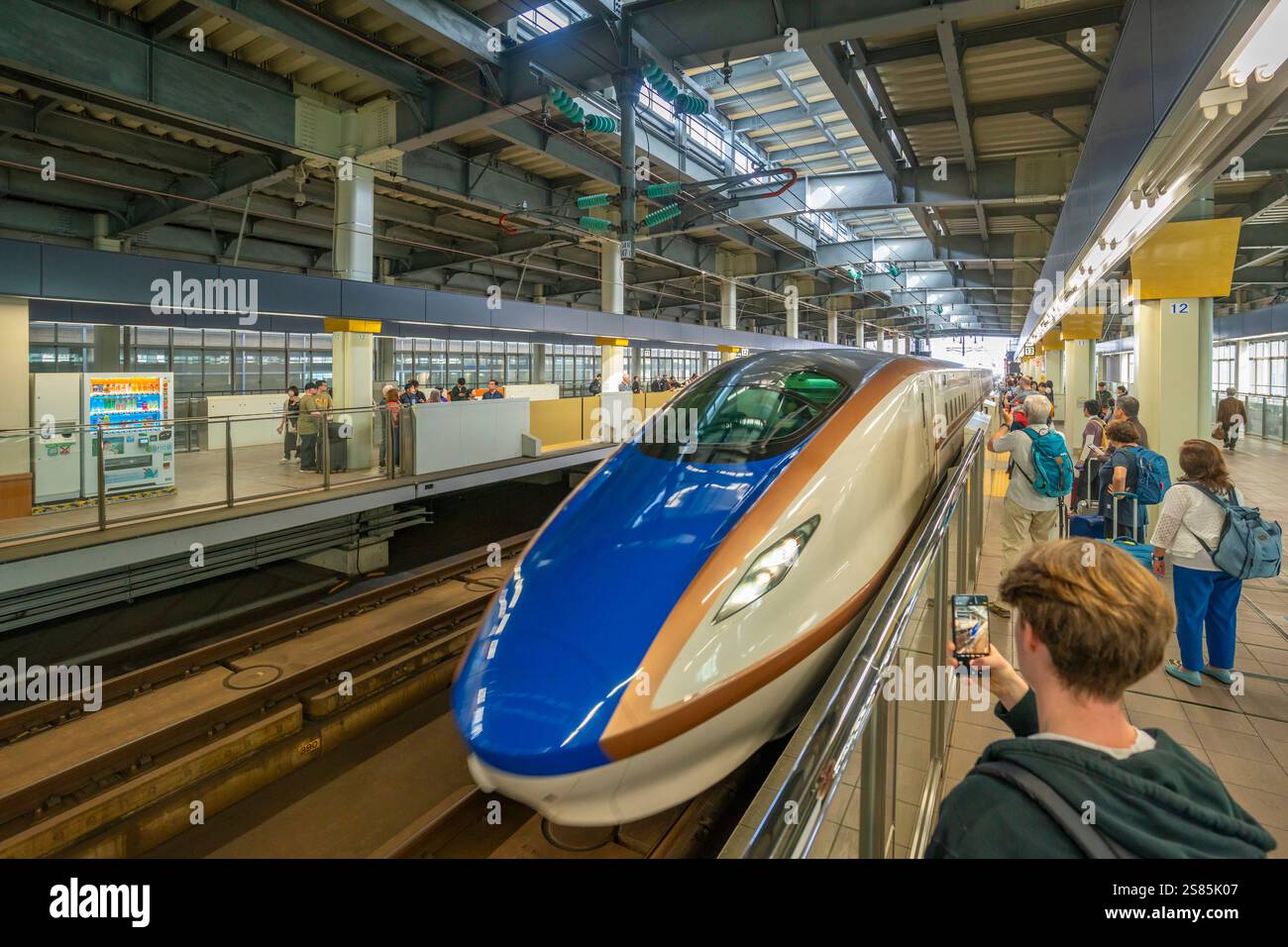Boarding the bullet train hi-res stock photography and