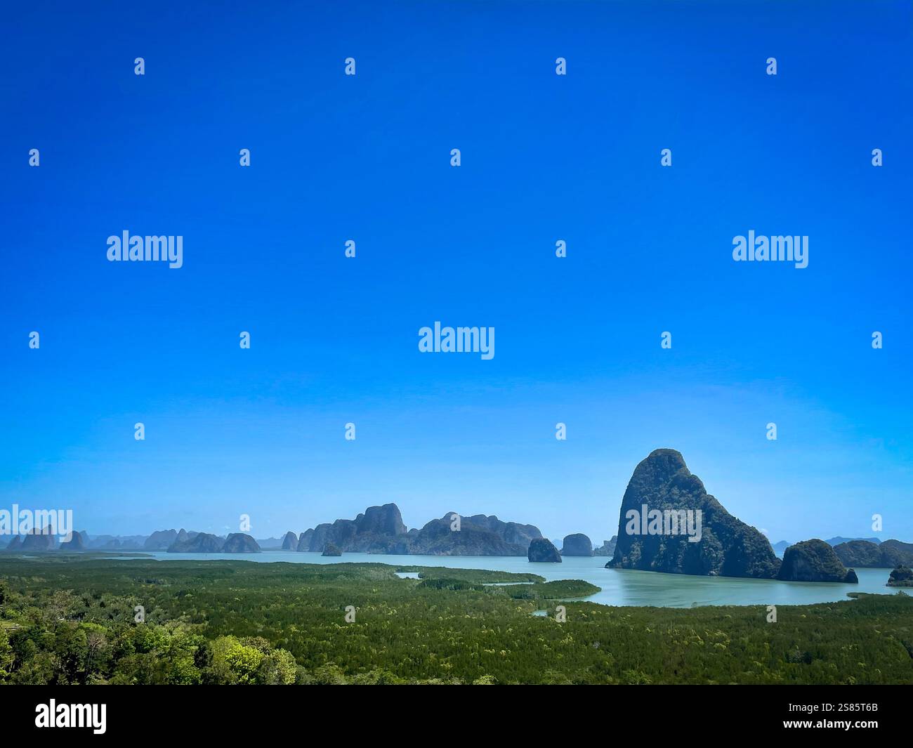 A breathtaking view of the Phang Nga mountains, showcasing their lush greenery and unique limestone formations. - Smartphone Captured Stock Image