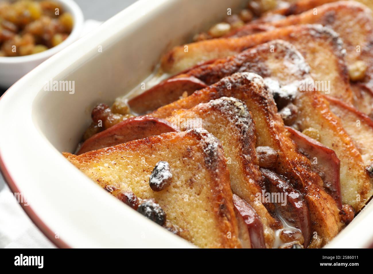 Freshly baked bread pudding in baking dish, closeup Stock Photo