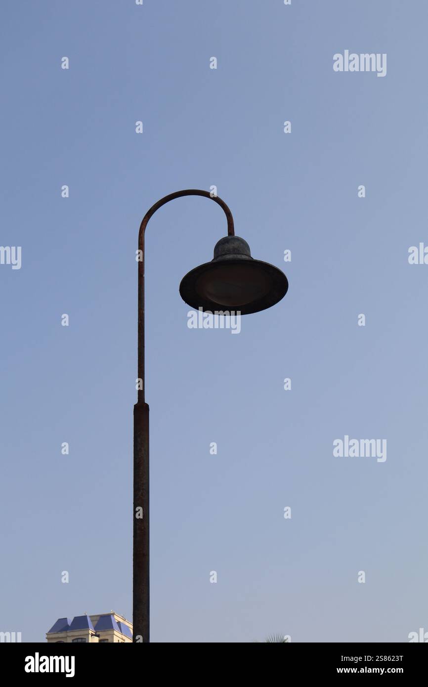 A street lamp under bright sky. Stock Photo