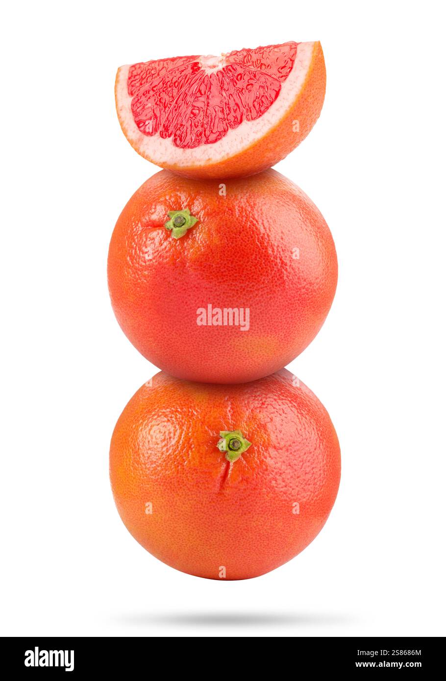 Fresh grapefruits in air on white background Stock Photo