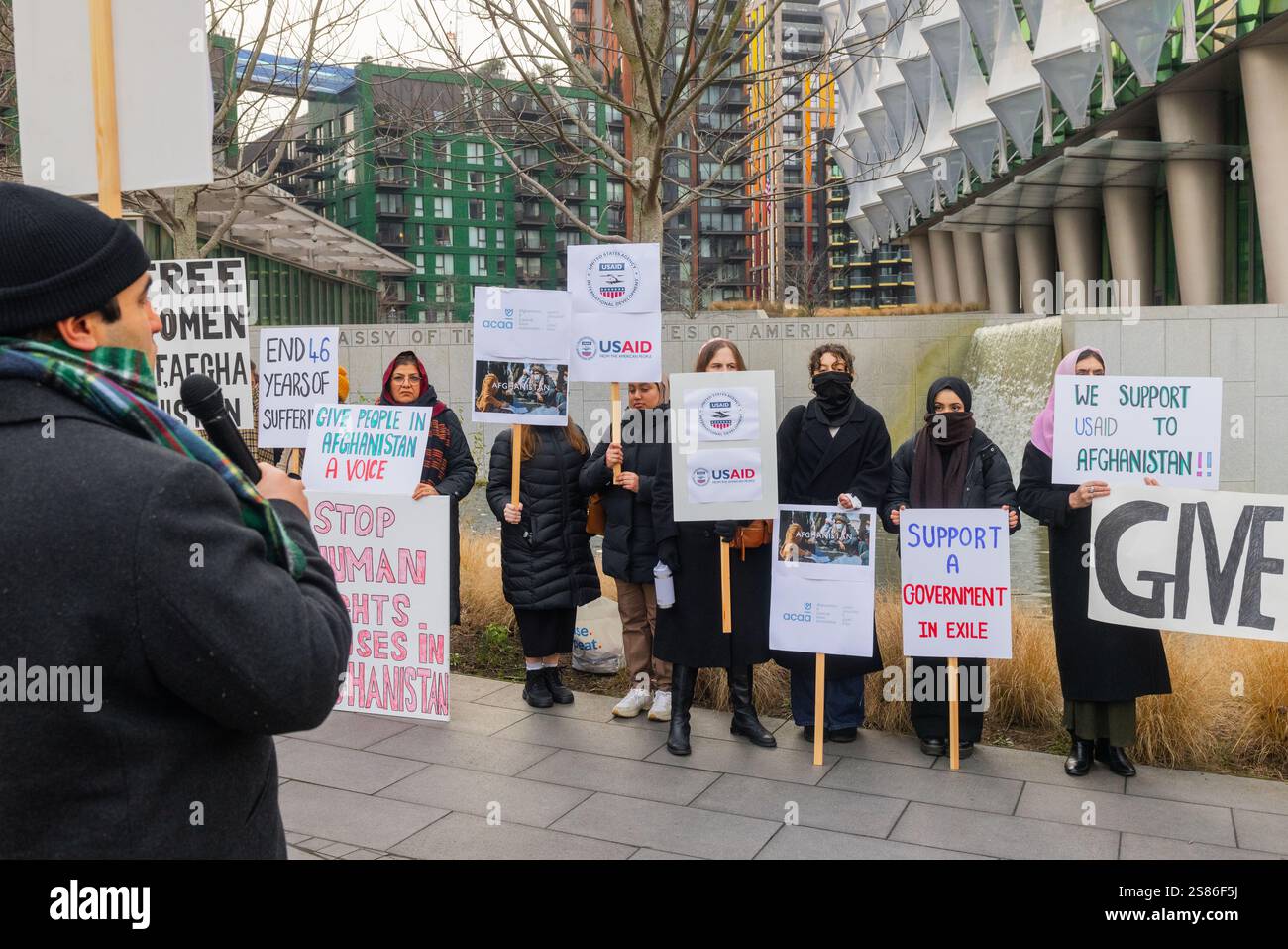 London, UK. 20 JAN, 2025. Demonstrators hold various signs related to ...
