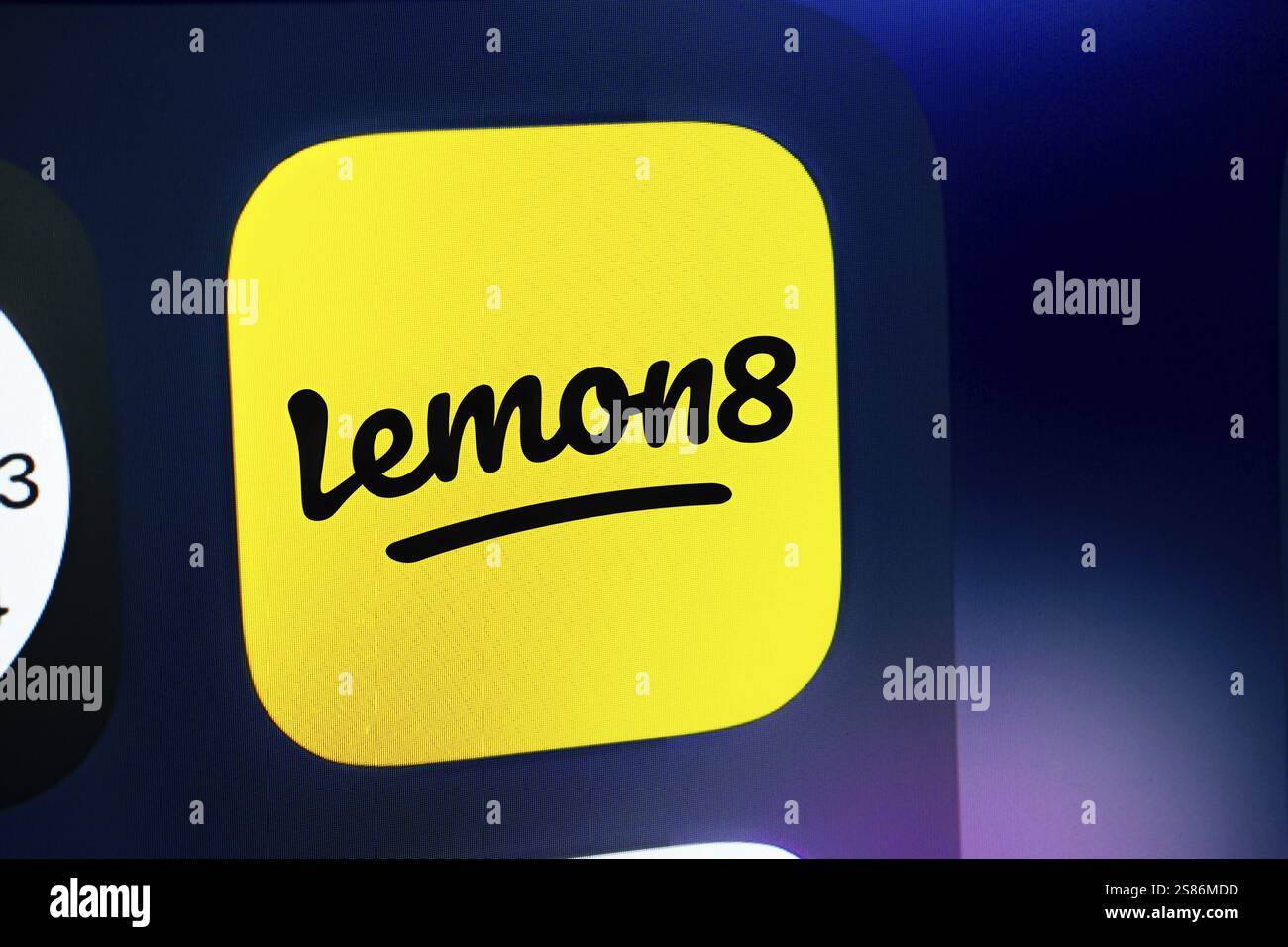 A close up of an iPhone screen displaying the Lemon8 logo. Lemon8 is a ...