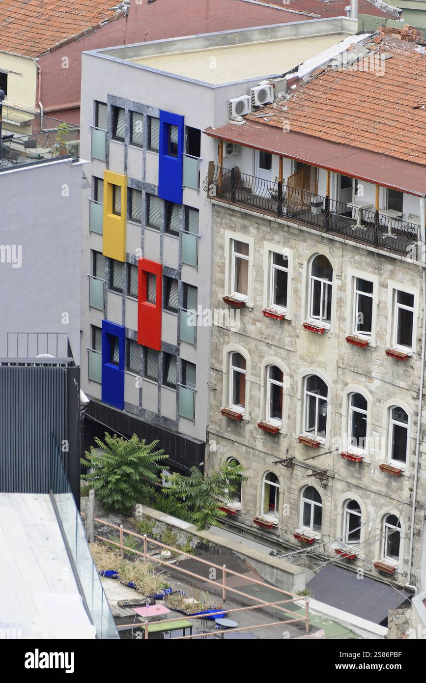 Facades of a building with colourful, modern panels and classical elements, Istanbul, Istanbul Province, Turkey, Asia Stock Photo