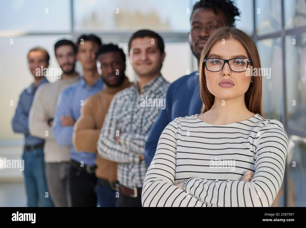 Group people standing in front hi-res stock photography and images - Alamy