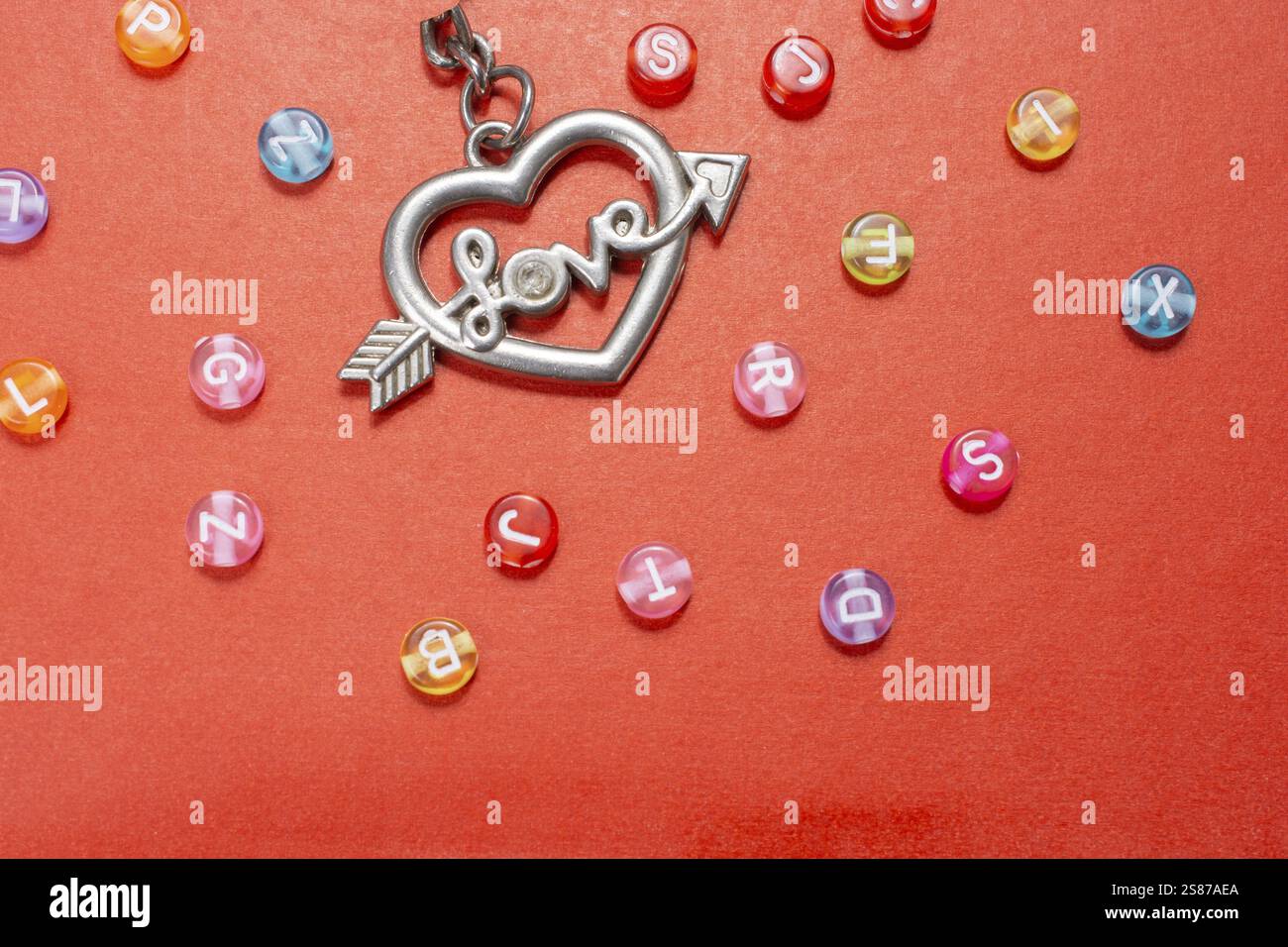 Heart shape and love wording amid colorful alphabet letters Stock Photo ...