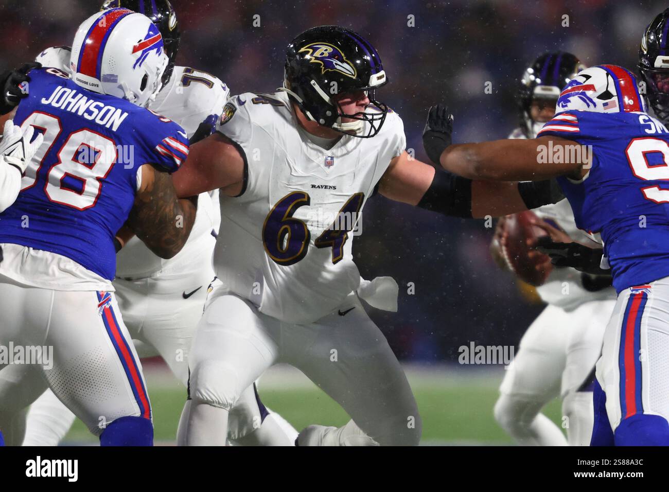 Baltimore Ravens center Tyler Linderbaum (64) blocks during the first ...