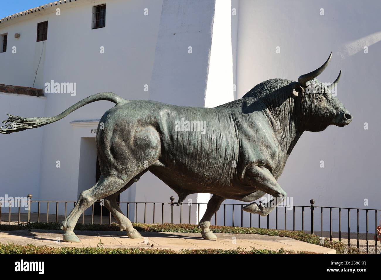 Bull sculpture in front of Bullring Plaza de Toros in the city of Ronda ...