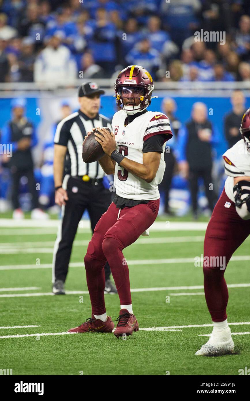 Washington Commanders quarterback Jayden Daniels (5) passes against the