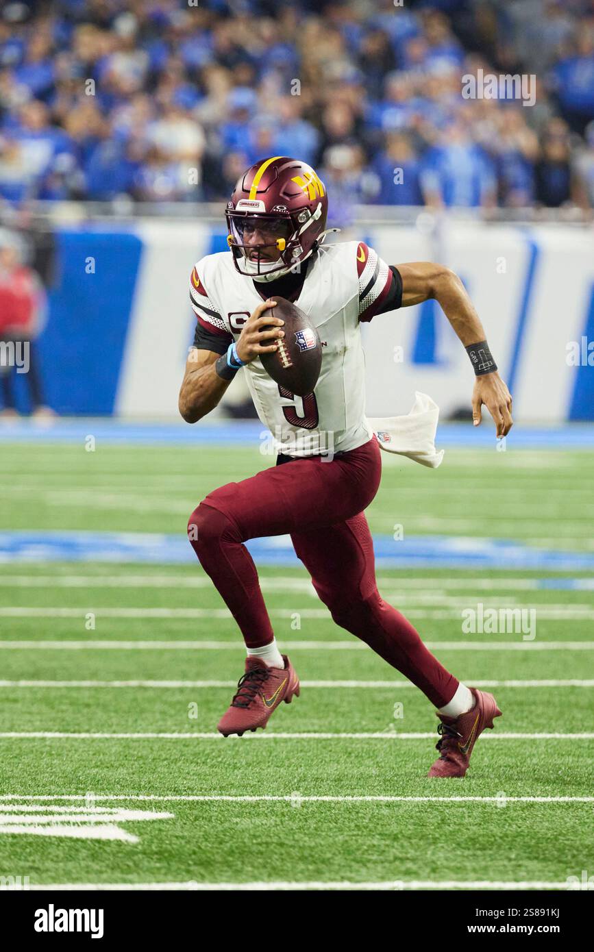 Washington Commanders quarterback Jayden Daniels (5) rushes against the