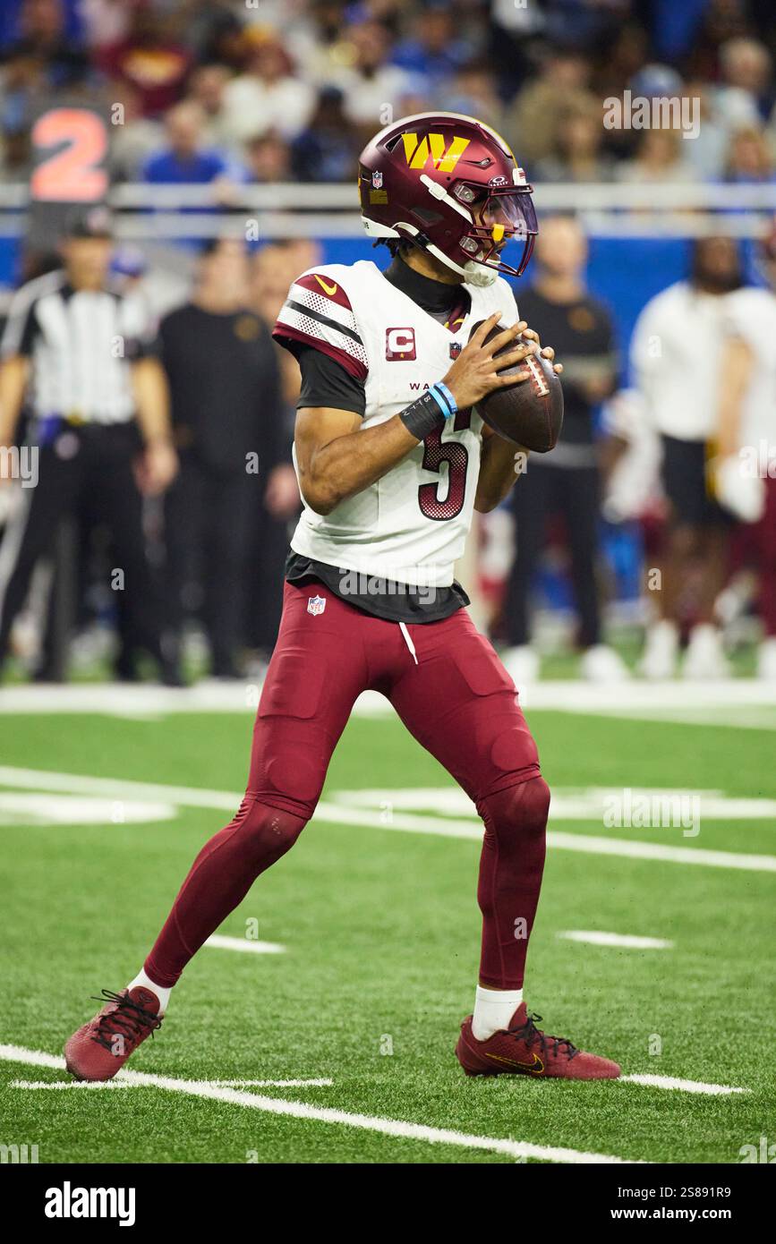 Washington Commanders quarterback Jayden Daniels (5) passes against the