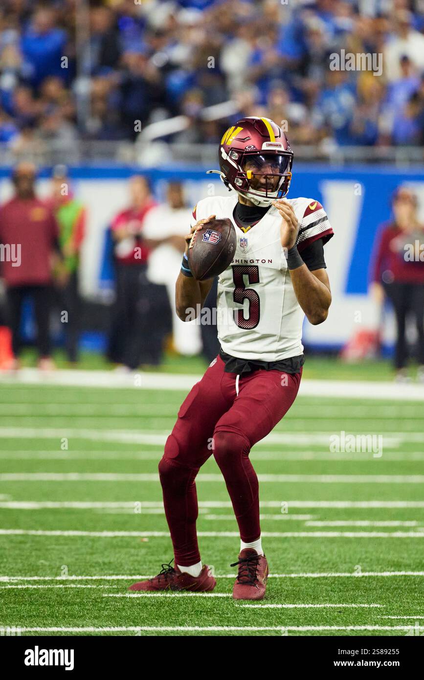 Washington Commanders quarterback Jayden Daniels (5) passes against the