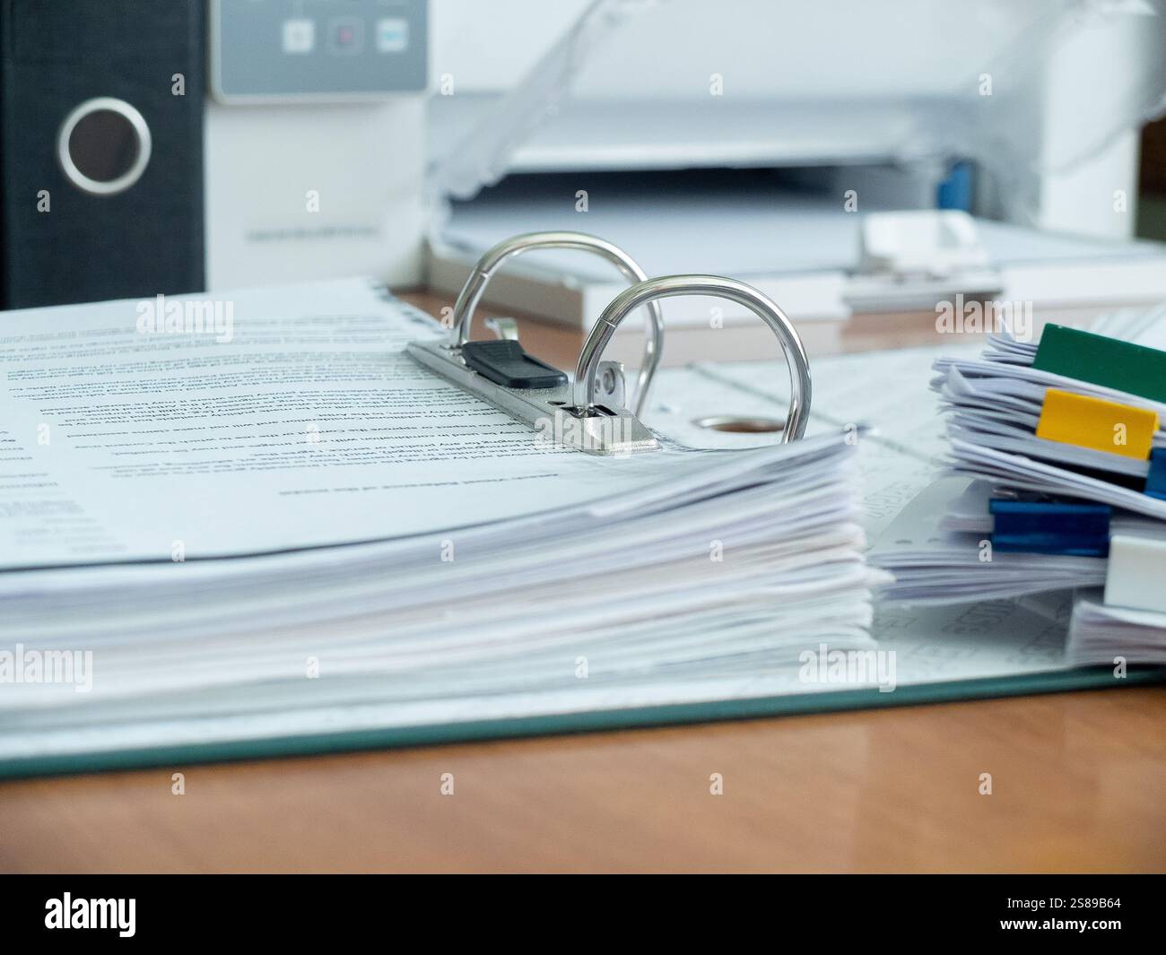 Document folder on the background of the printer Stock Photo
