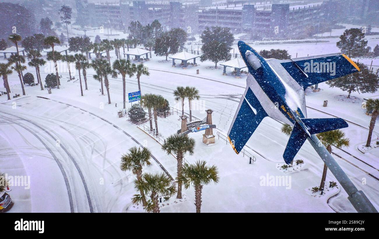 Heavy snow falls onto the Florida Center on Tuesday, Jan. 21