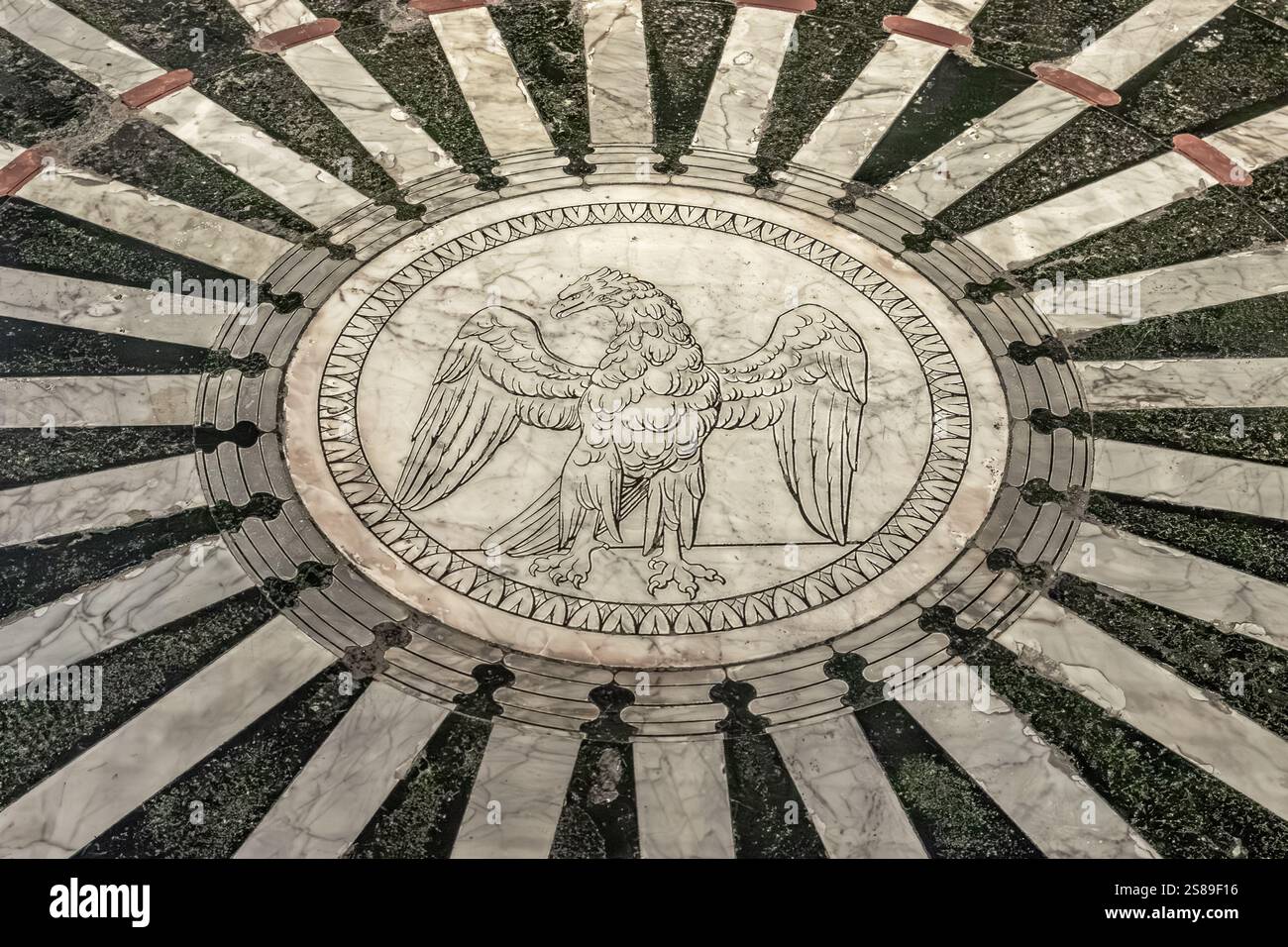 A  depiction of an eagle in marble on the floor of the central nave inside Siena Cathedral,Siena, Italy Stock Photo