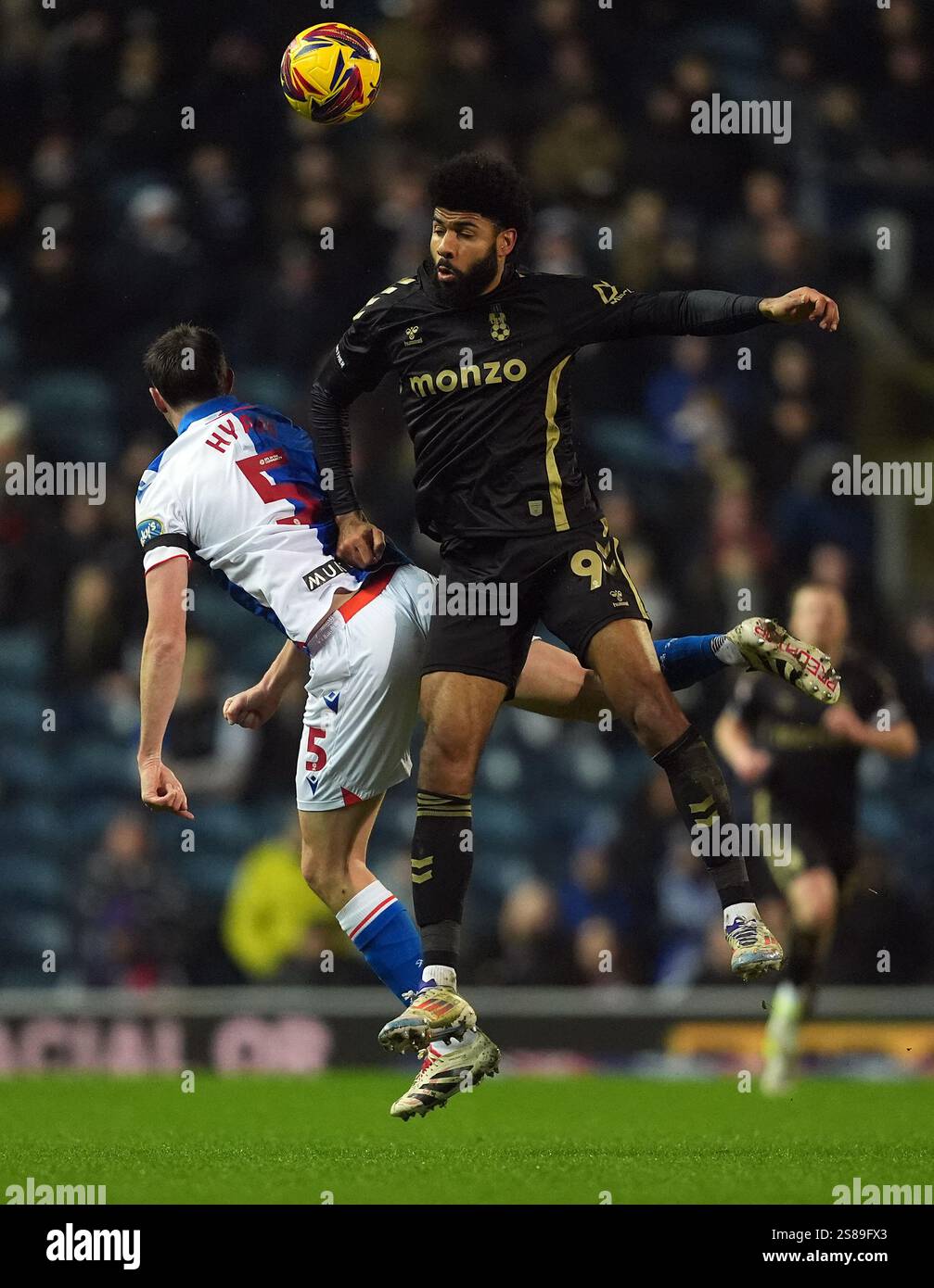 Blackburn Rovers' Dominic Hyam and Coventry City's Ellis Simms (right ...