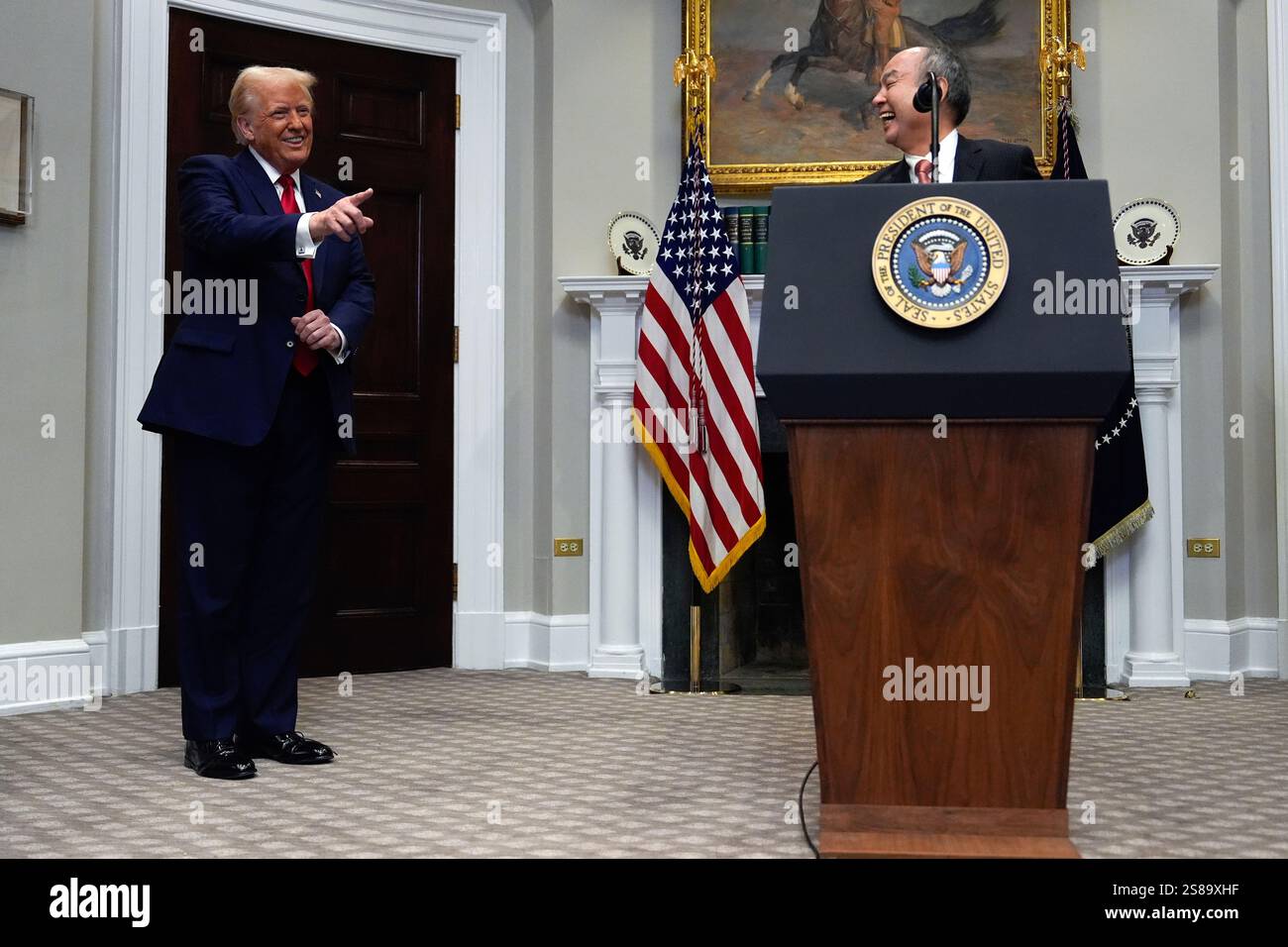 President Donald Trump laughs with Masayoshi Son, SoftBank Group CEO