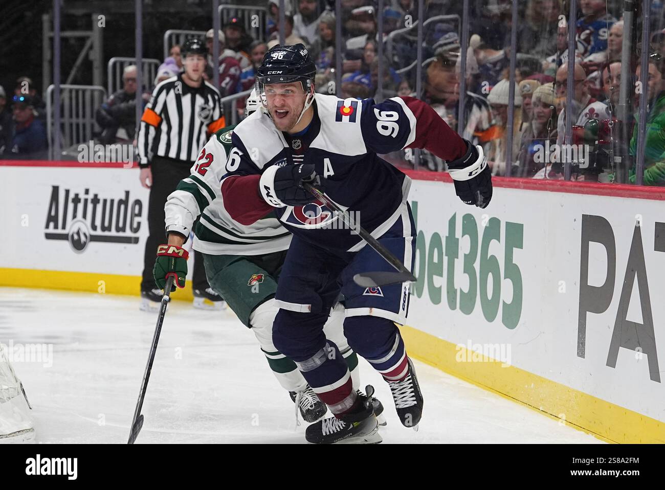 Colorado Avalanche right wing Mikko Rantanen (96) and Minnesota Wild