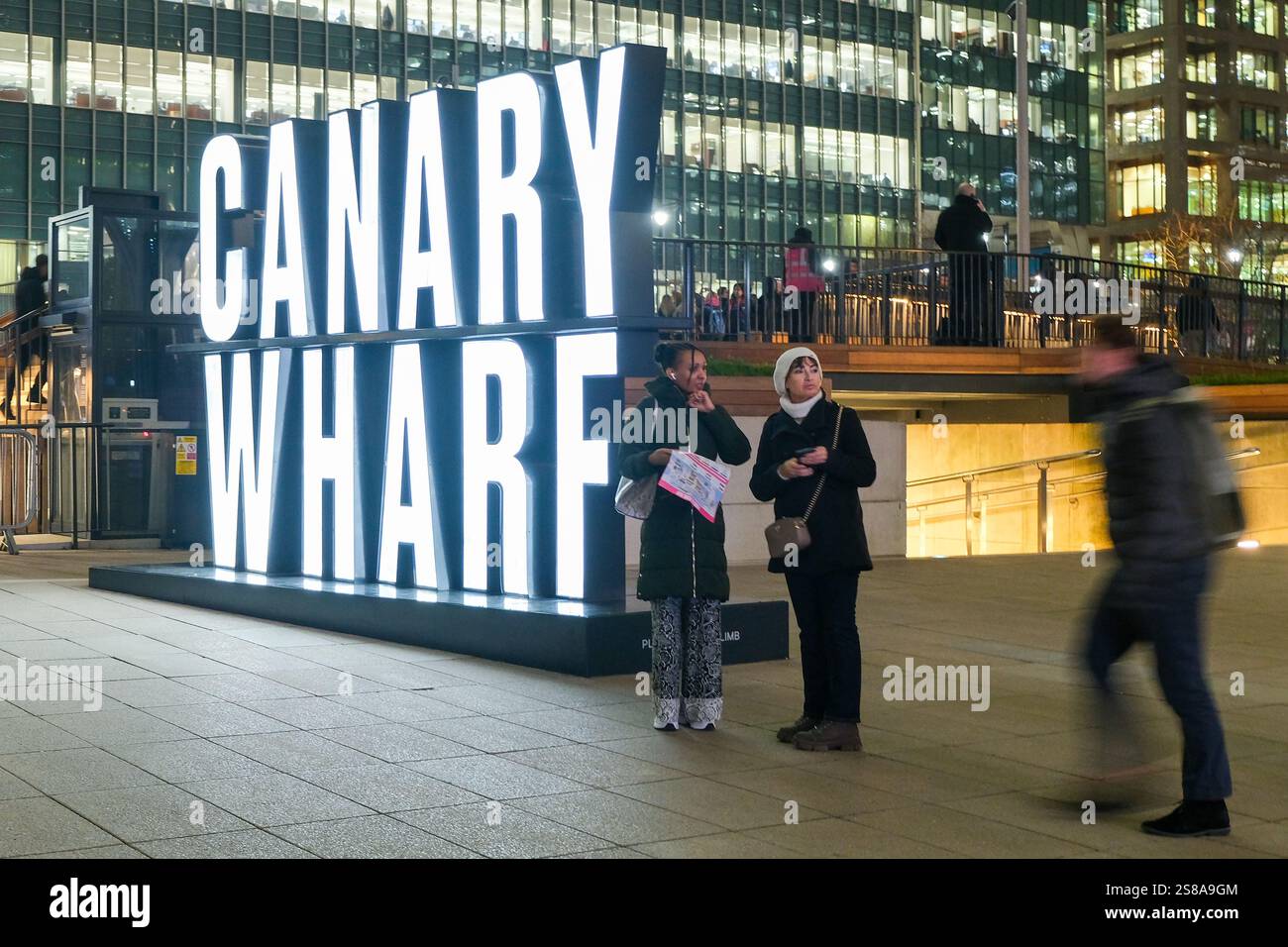 An oversized illuminated Canary Wharf sign welcomes visitors on the ...