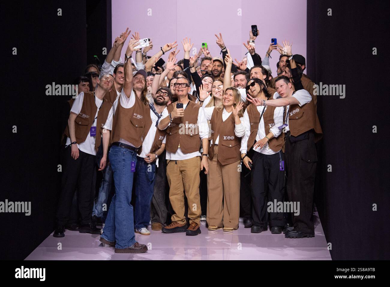 Designer Pharrell Williams makes an appearance on the runway during the