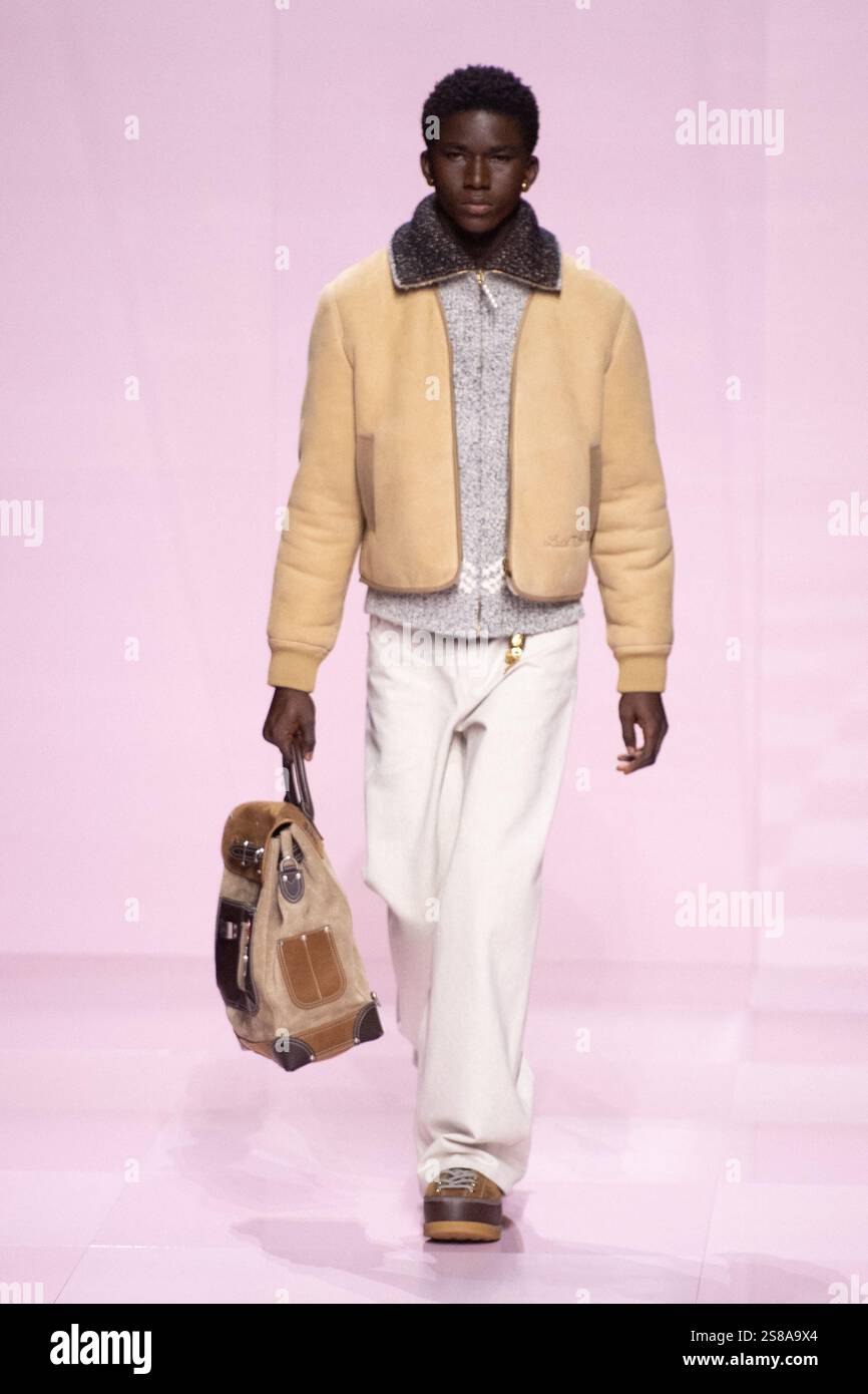 A model walks the runway during the Louis Vuitton Menswear FallWinter