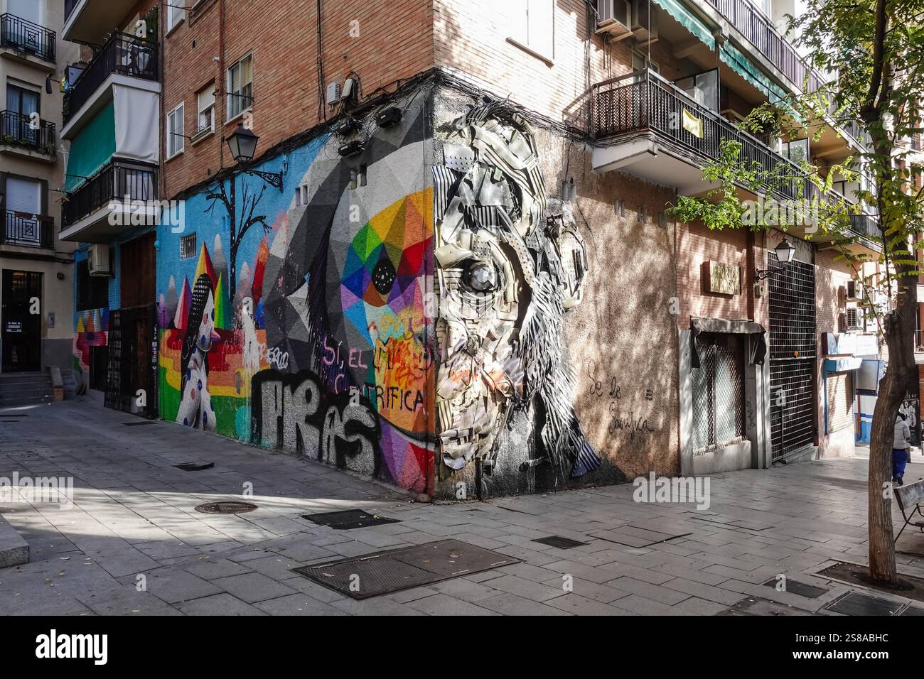 An outdoor mural by Spanish artist Okuda and Portuguese artist