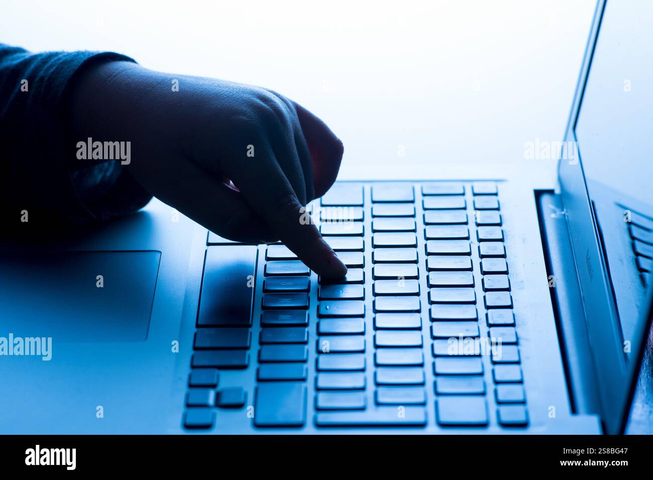 File photo dated 04/03/17 of a child's hand pressing a key of a laptop keyboard. The Internet Watch Foundation (IWF), which proactively searches for and helps remove child sexual abuse imagery from the internet, has written to the Prime Minister warning "blatant get-out clause" to evade compliance with parts of the Online Safety Act, which is due to begin coming into force this year. Issue date: Wednesday January 22, 2025. Stock Photo