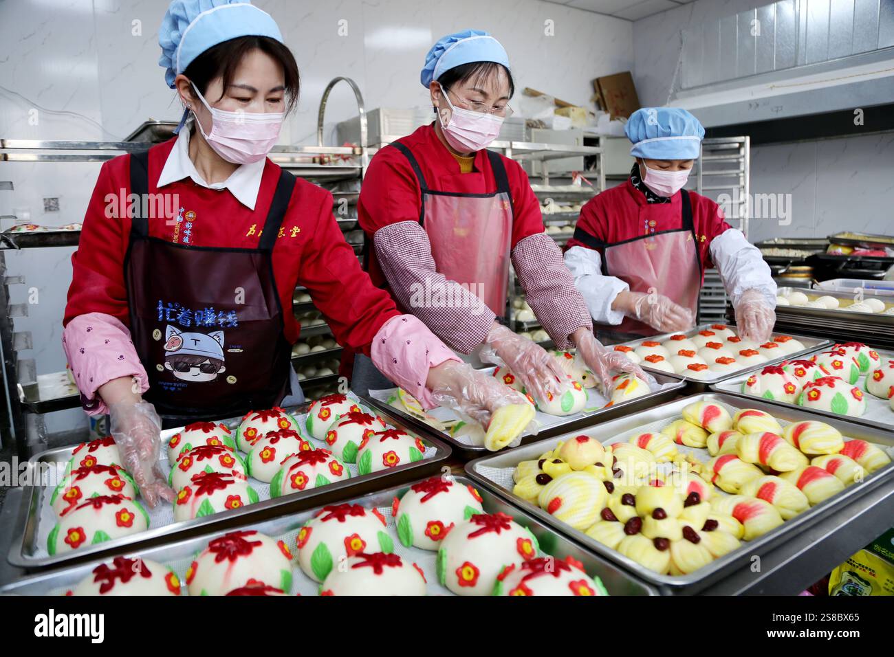 Bakers make Chinese Lunar New Year food HUAMO in Lianyungang, East