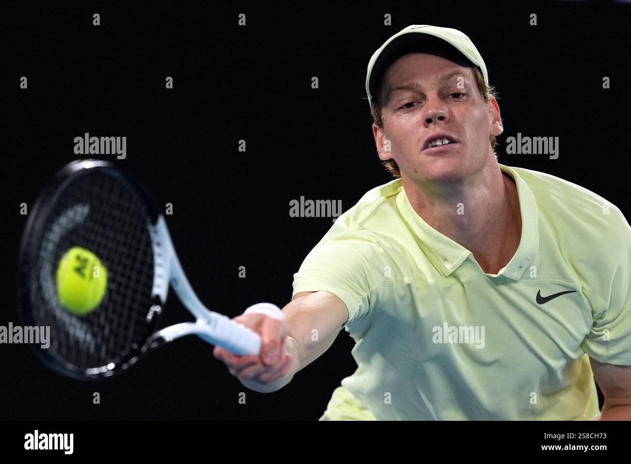 Jannik Sinner of Italy plays a forehand return to Alex de Minaur of Australia during their
