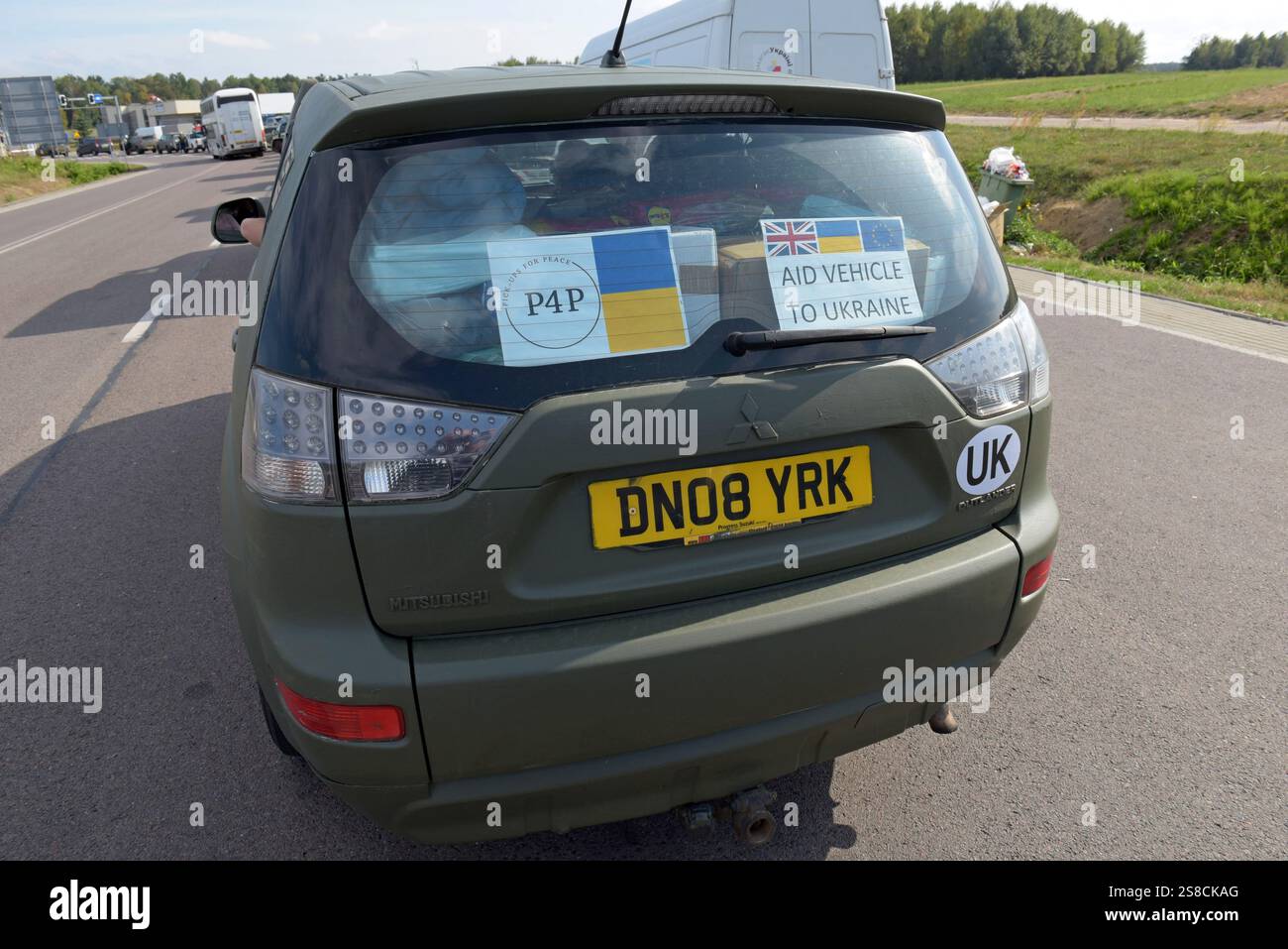 Queue of 4x4 vehicles at the Poland - Ukraine border waiting to enter Ukraine on an aid convoy with the Pickups for Peace charity, Sept 2024 Stock Photo