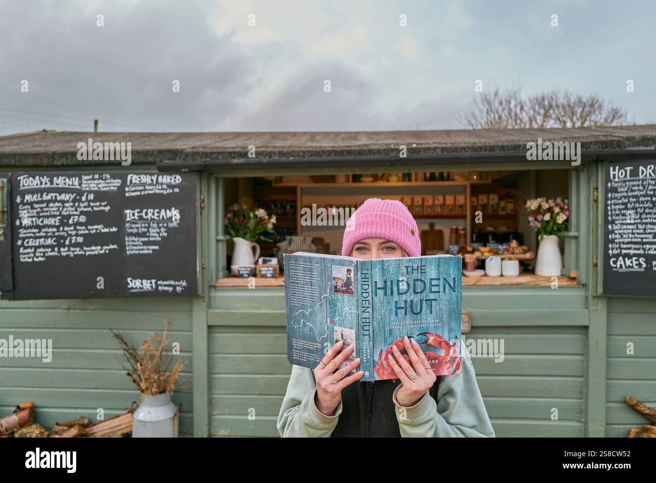 Hidden Hut rustic cookbook at the Hidden Hut cafe at Porthcurnick Beach, Cornwall, UK Stock Photo