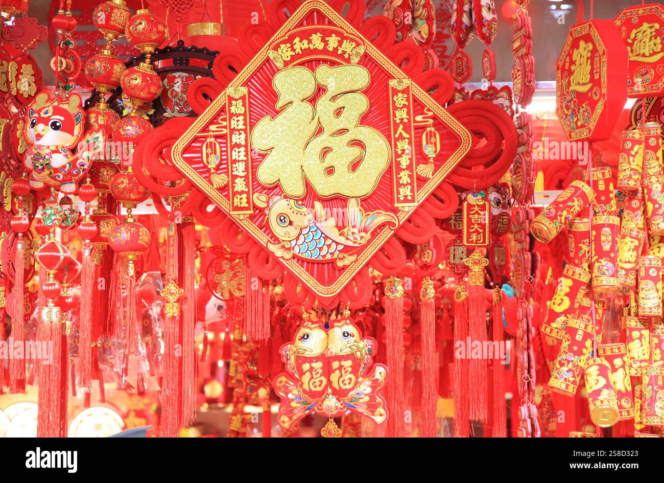 People select Spring Festival decorations at a market in Nanjing City