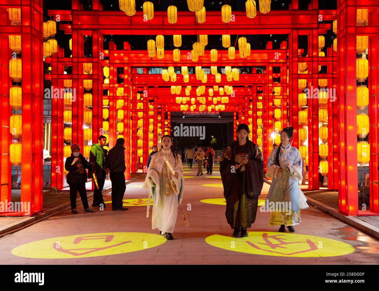 HAIAN, CHINA JANUARY 22, 2025 Tourists enjoy colorful lanterns at