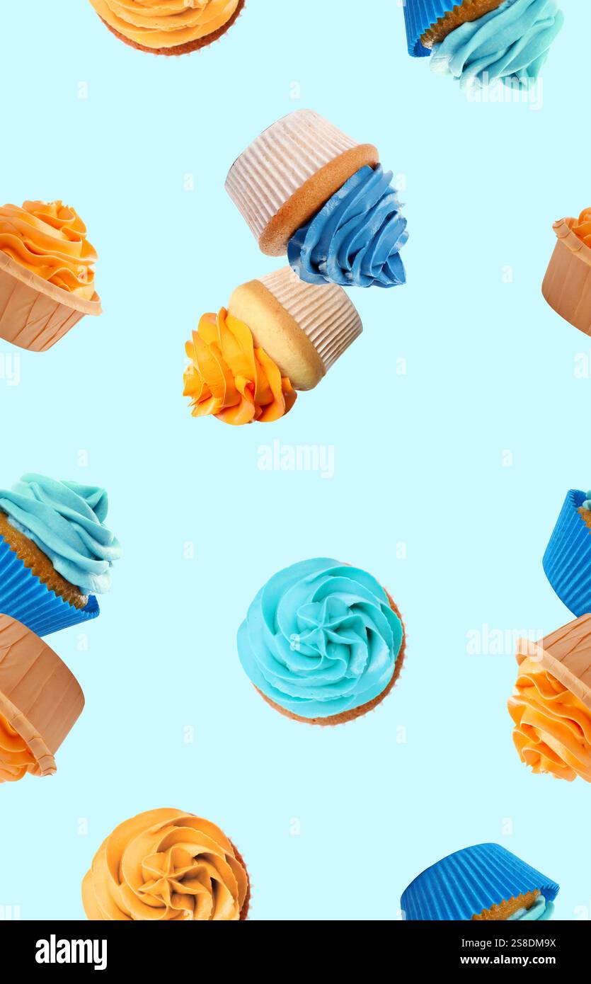 Pattern of cupcakes with bright cream on light blue background Stock Photo