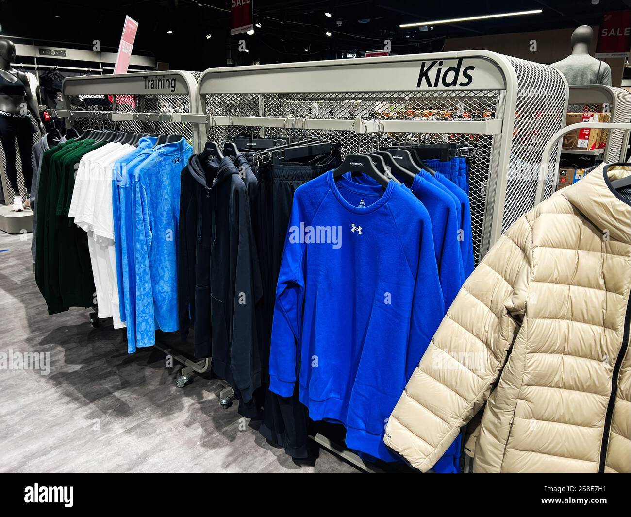 Kyiv, Ukraine - January 21, 2025: An organized kidswear clothing rack ...