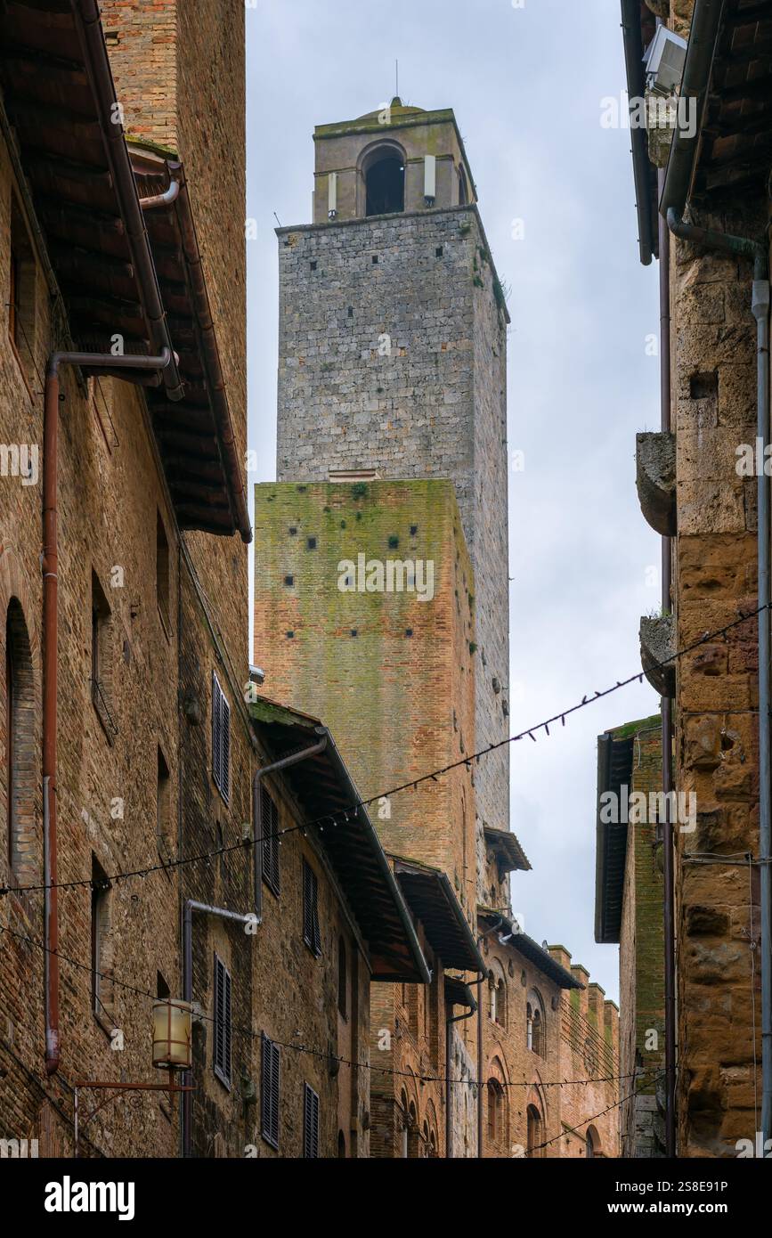A striking view of San Gimignano's iconic medieval towers framed by ...