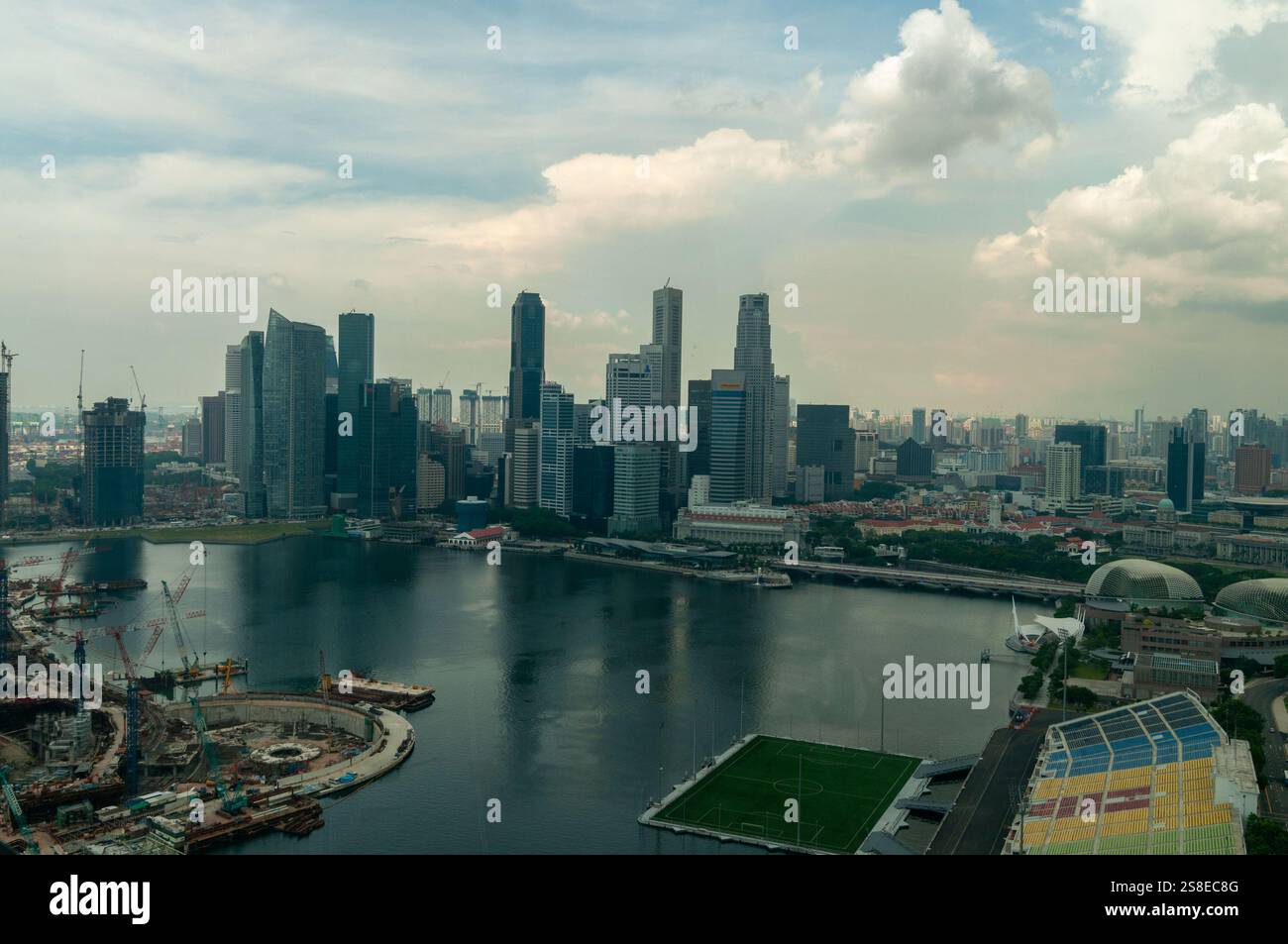 A high view of the Singapore modern skyline including Marnia Bay, (Reclaimed land from the sea) and the backdrop of the financial district in Singapor Stock Photo